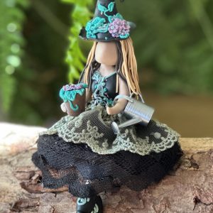 Handmade Garden Witch polymer clay figurine with watering can and flowers